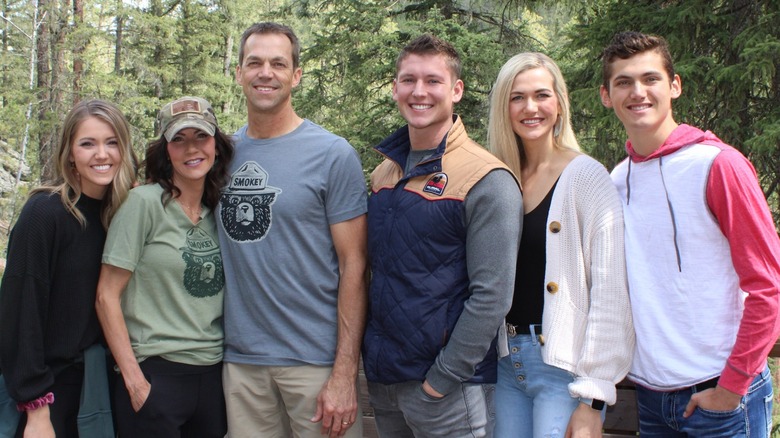 Kristi and Bryon Noem smiling with their kids and son-in-law