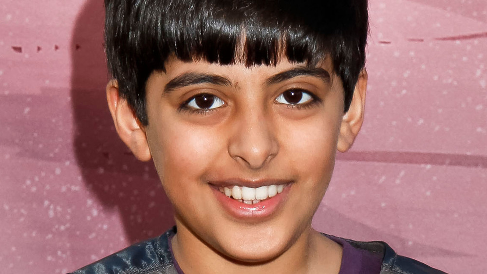 Karan Brar smiling, close-up