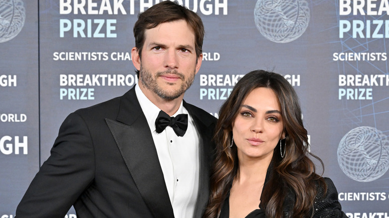 Ashton Kutcher and Mila Kunis in formalwear