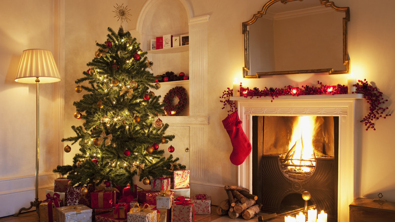 A christmas tree in a warm living room 