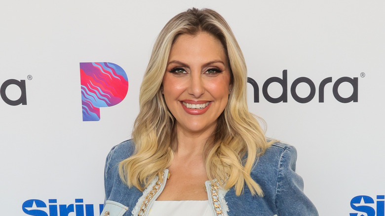 Gina Kirschenheiter smiling on the red carpet in July 2025.