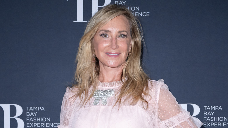 Sonja Morgan smiling on the red carpet in September 2025.