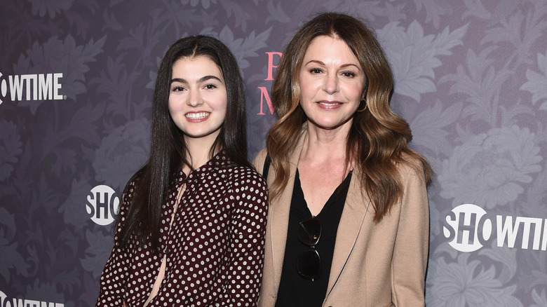 Jane Leeves smiles standing next to her daughter Isabella Cohen at a red carpet premiere