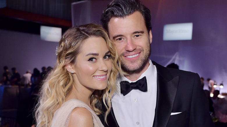 Lauren Conrad (L) and William Tell pose at the 2018 Baby2Baby Gala Presented by Paul Mitchell at 3LABS on November 10, 2018 in Culver City, California.