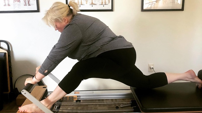 Janelle Brown doing pilates