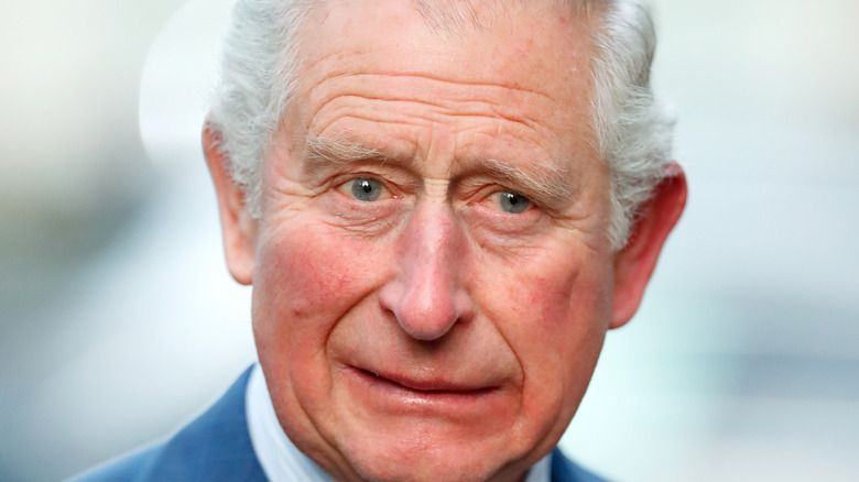 King Charles cringing