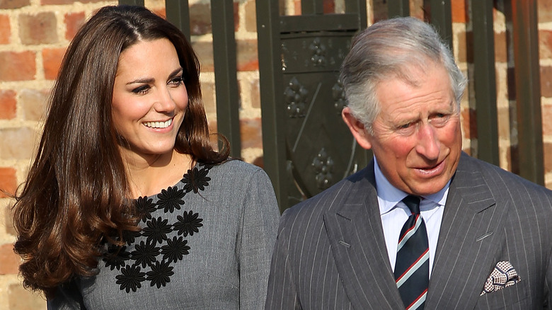 Kate Middleton and King Charles smiling