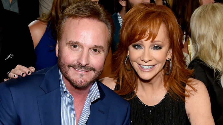 Reba McEntire and Narvel Blackstock posing together