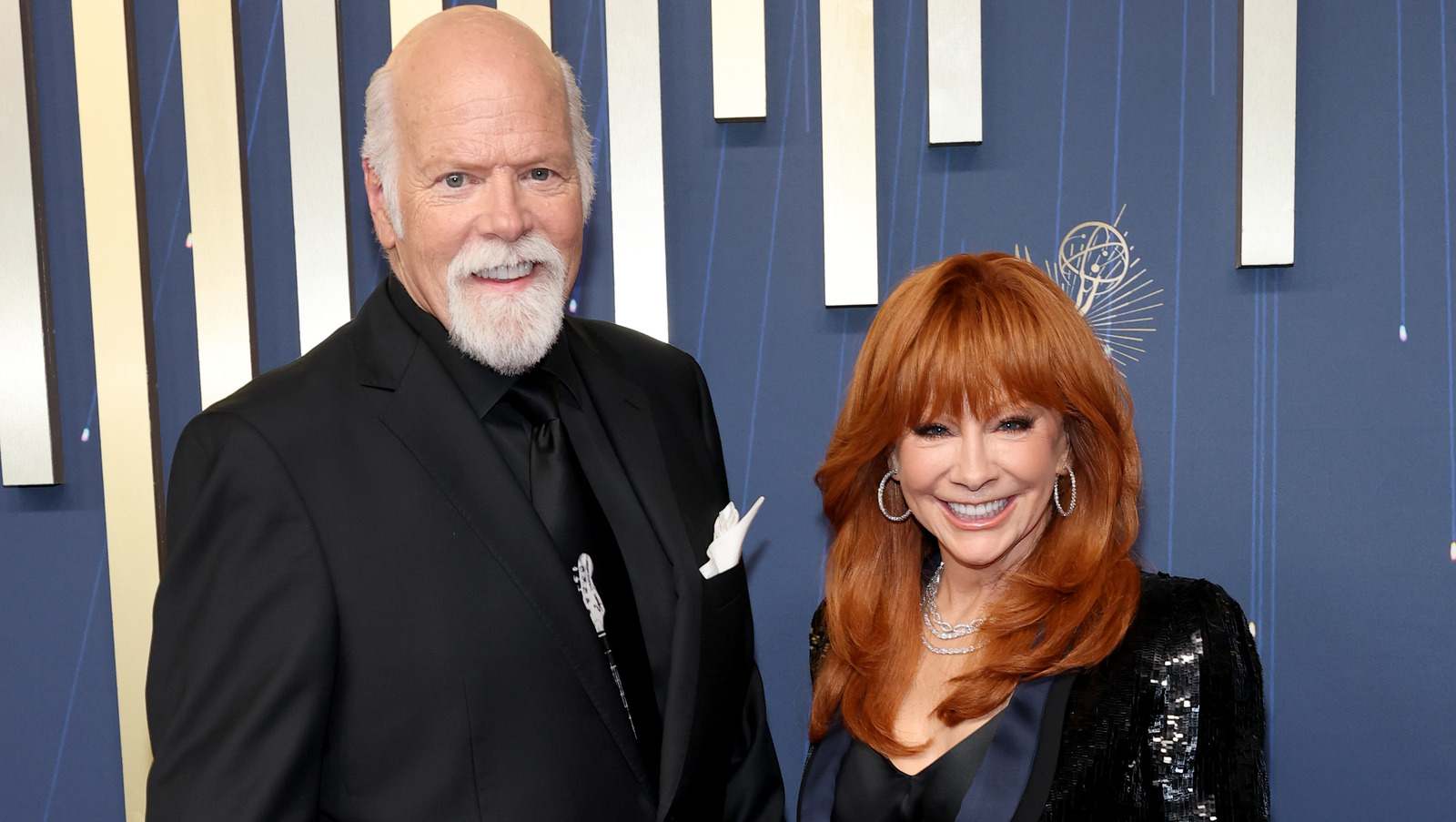 <a href="https://www.thelist.com/1967875/reba-mcentire-rex-linn-confirm-engagement-rumors-2025-emmys/" target="_blank">Reba McEntire & Rex Linn Confirm Longtime Rumor At 2025 Emmys</a>
