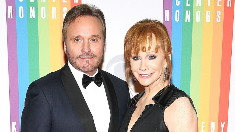 Narvel Blackstock and Reba McEntire smiling