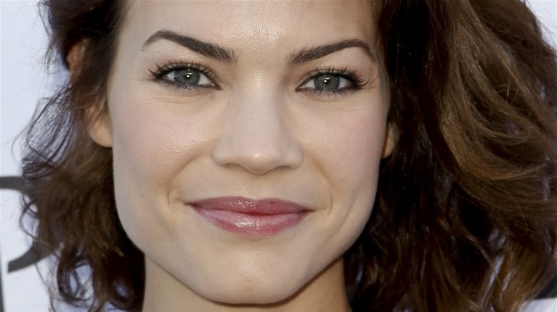 Rebecca Herbst posing on the red carpet