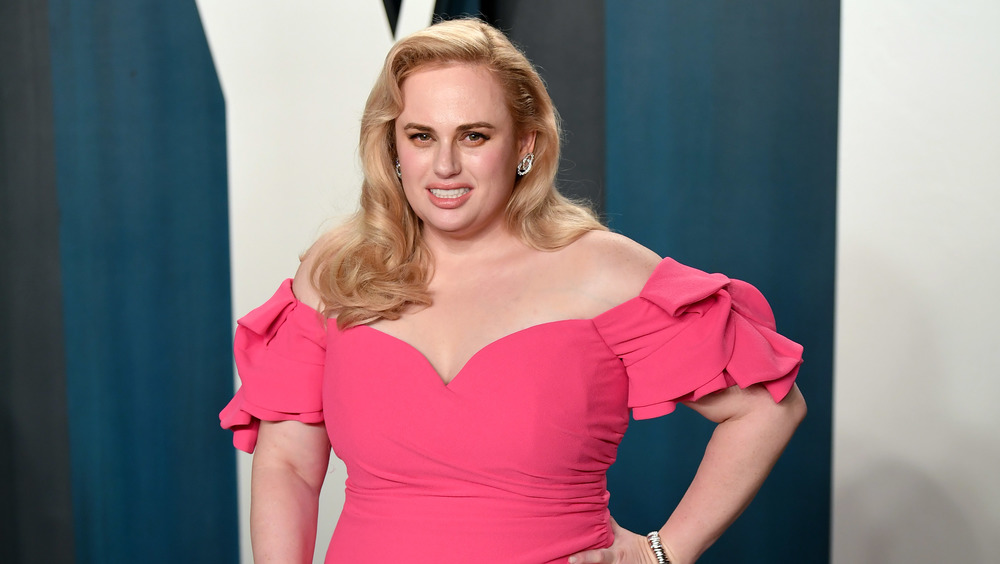 Rebel Wilson wears red gown