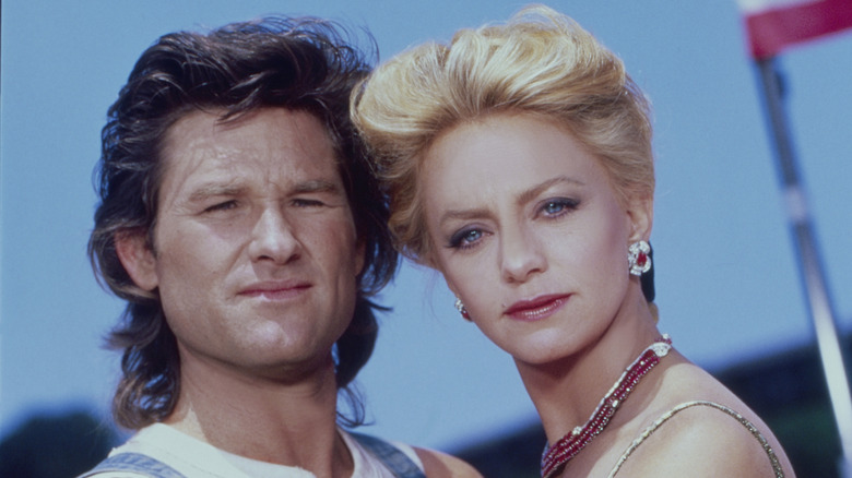 Kurt Russell and Goldie Hawn looking serious