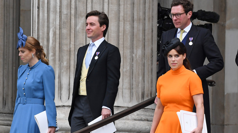 Beatrice and Eugenie with Mapelli Mozzi and Brooksbank behind them