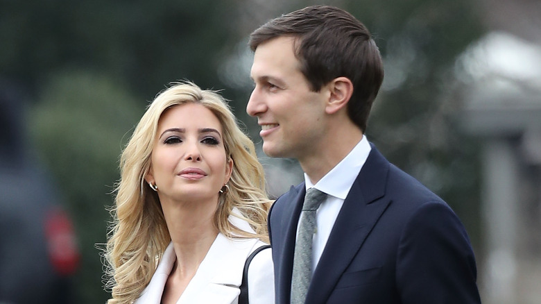 Ivanka Trump smiling at Jared Kushner
