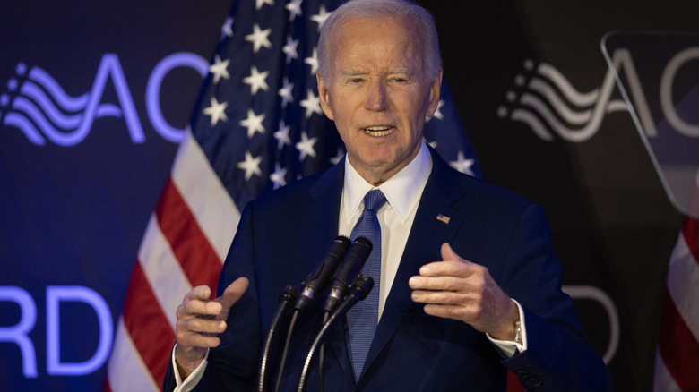 Joe Biden speaking at podium April 2025