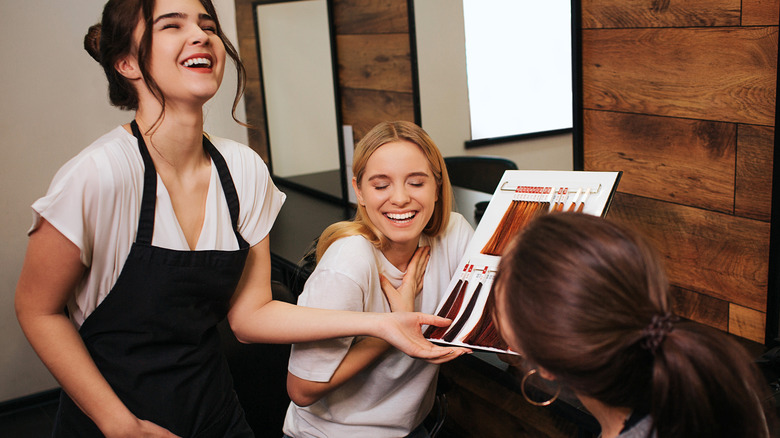 Hairdressers chatting at salon