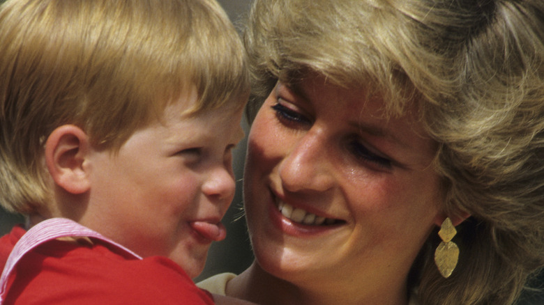 Close up of Princess Diana holding baby Prince Harry