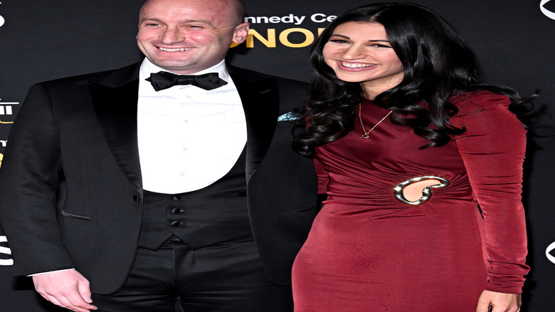 Stephen Miller and Katie Miller smiling for a photograph.