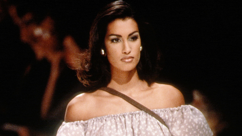 Yasmeen Ghauri close up on the runway.