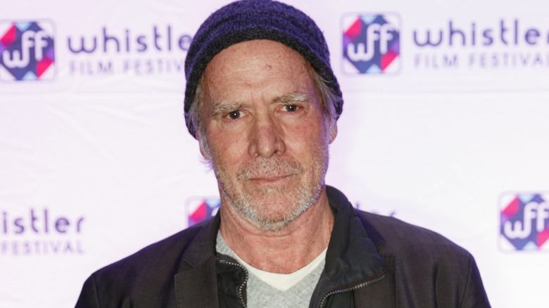 Will Patton looking straight into camera at a press event