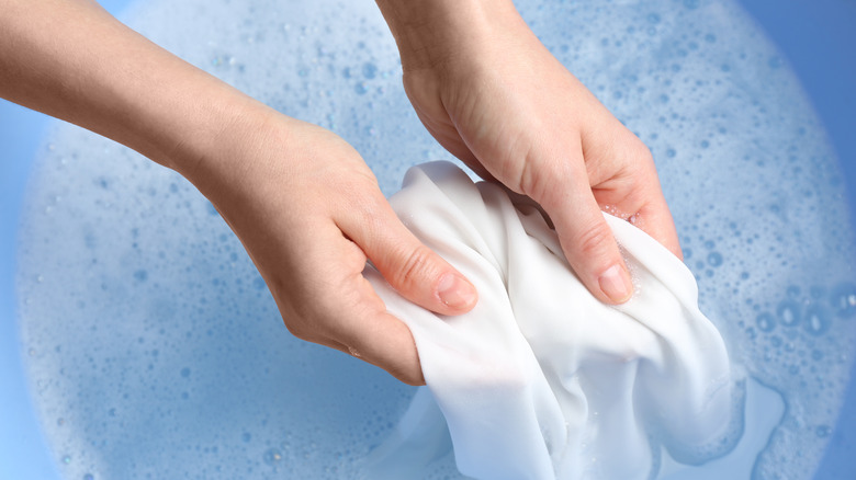 washing in soapy tub