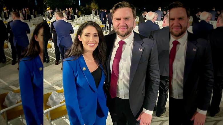 Anna Paulina Luna smiling in a blue blazer next to Vice President JD Vance