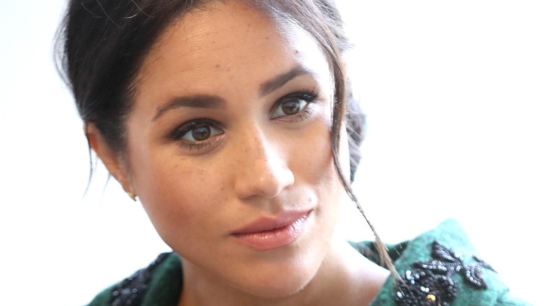 Meghan Markle looks concerned during an interview