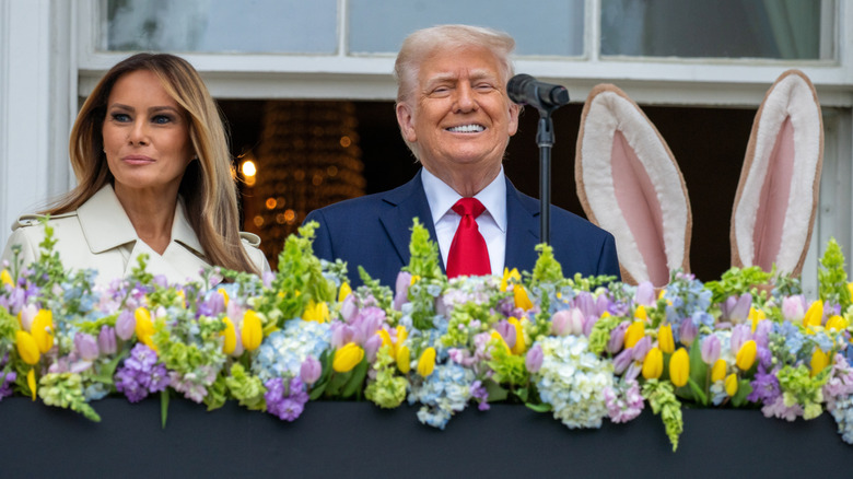 Donald and Melania Trump next to Easter Bunny ears