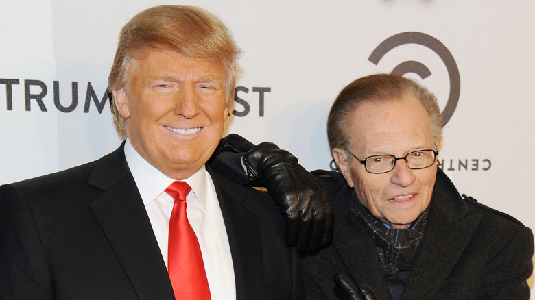 Donald Trump and Larry King posing together