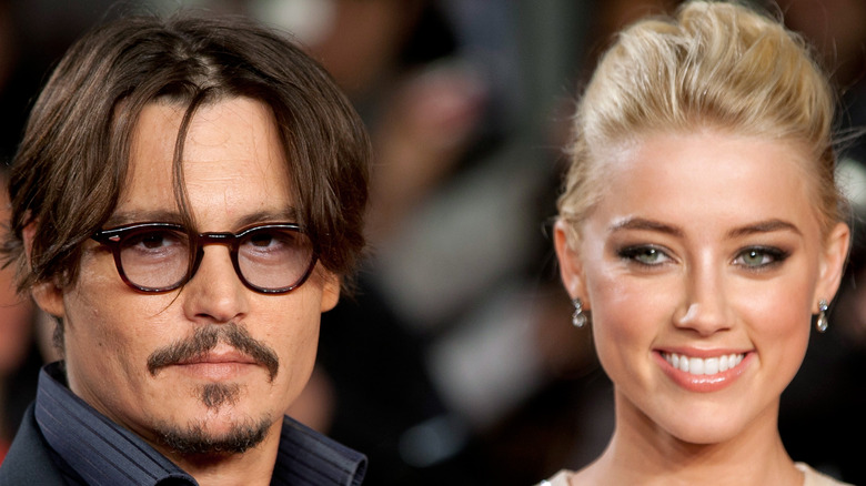 Johnny Depp and Amber Heard pose