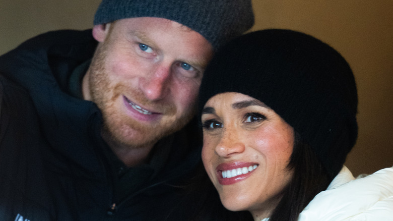 Prince Harry and Meghan Markle smiling