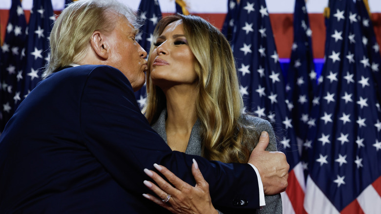 Donald and Melania Trump sharing their signature air kiss