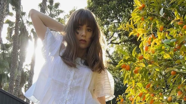 Lily Collins soft jellyfish bangs 