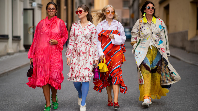 Women walking in bright colors