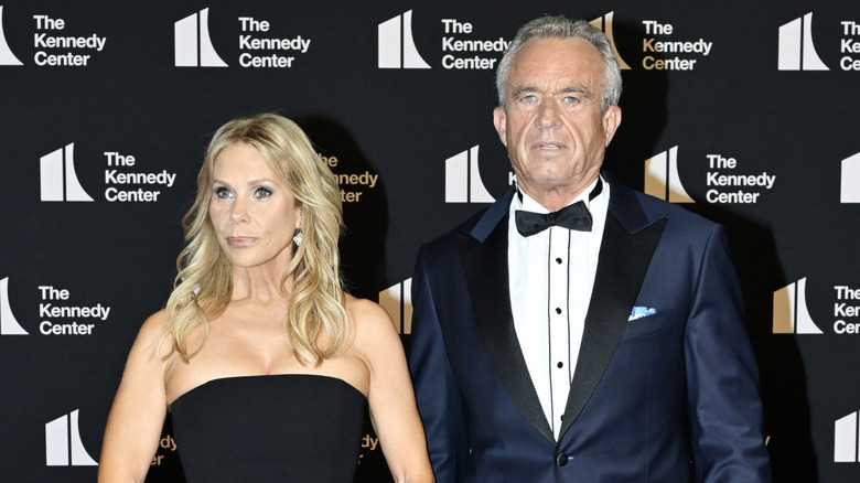 Cheryl Hines and RFK Jr. at Kennedy Center looking serious