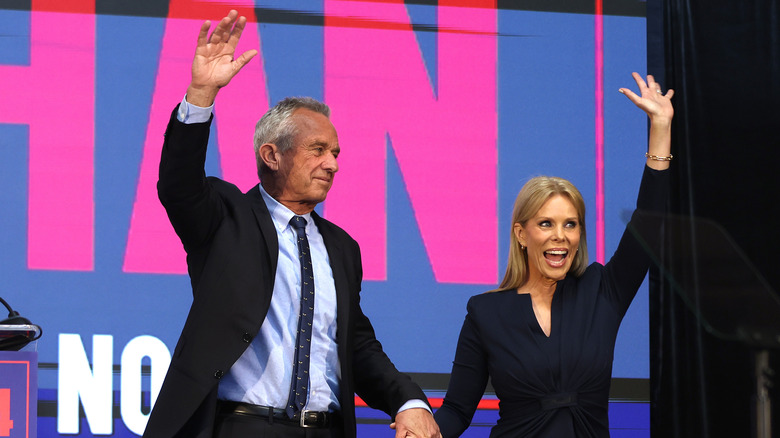 RFK Jr. and Cheryl Hines waving