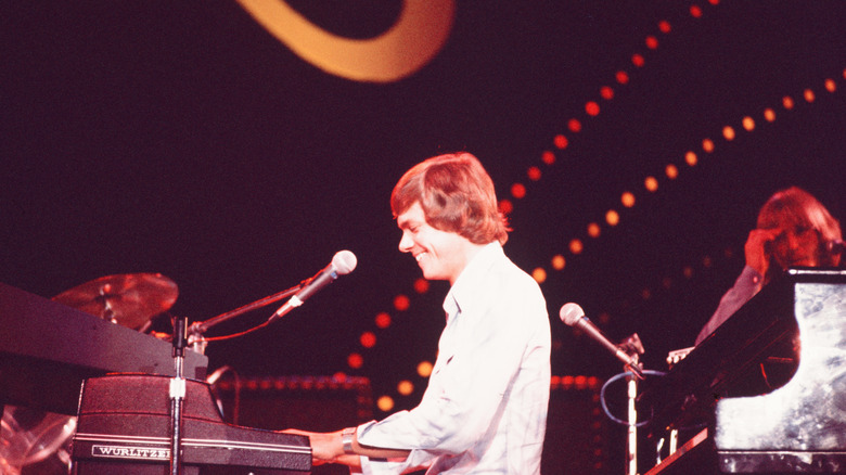 Richard Carpenter performing on stage in the 1970s