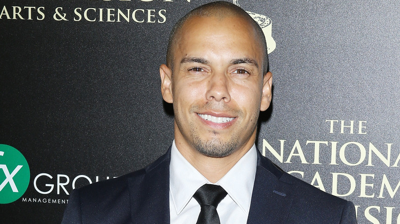 Bryton James smiling