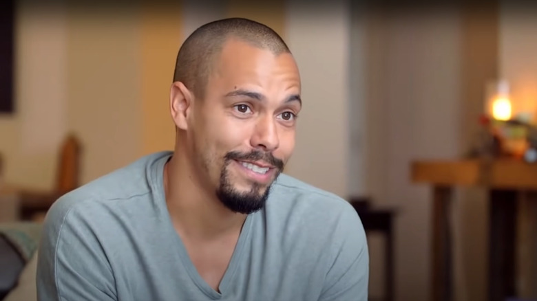 Bryton James smiling