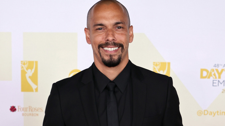 Bryton James smiling