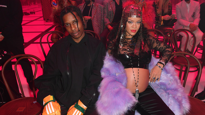 A$AP Rocky and a pregnant Rihanna sitting