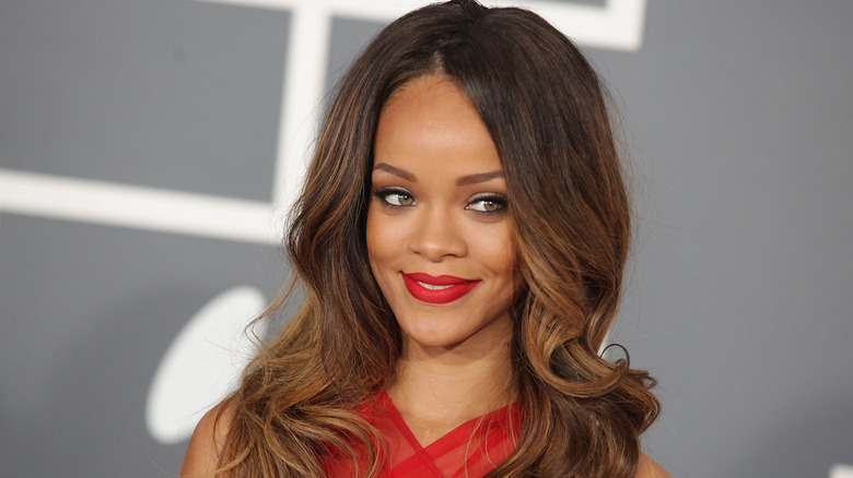Rihanna attends a red carpet event