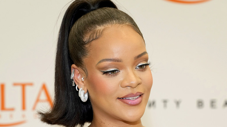 Rihanna with slicked back hair 