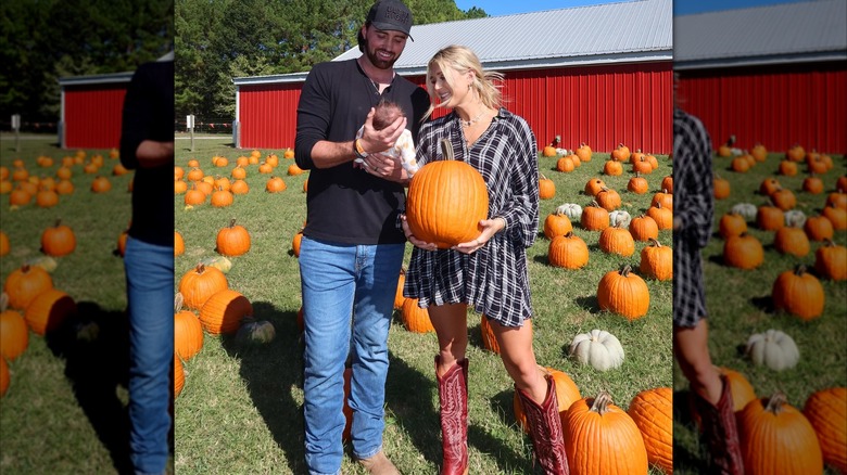 Riley Gaines, Louis Barker, and their infant daughter Margot at a pumpkin patch