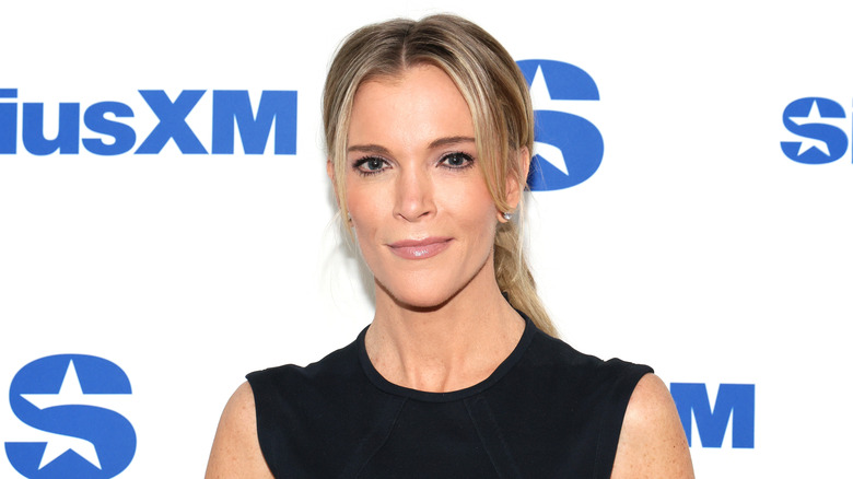 Megyn Kelly smiling in an outdoor setting