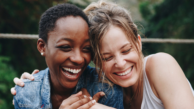 Female couple smiling