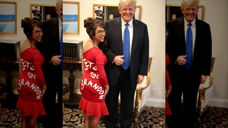 Lauren Boebert in a "Let's go Brandon" dress, standing next to Donald Trump