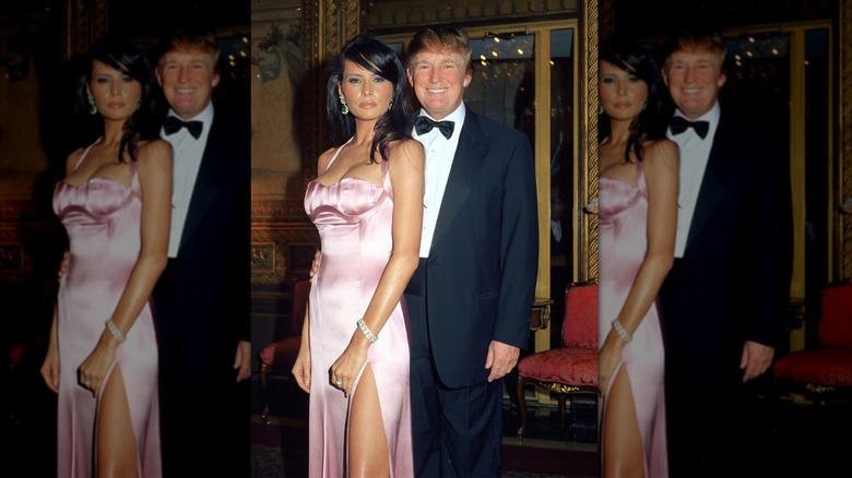 Melania Trump and Donald Trump pose together during a New Year's Eve party at the Mar-a-Lago estate in Palm Beach, Florida (2002)