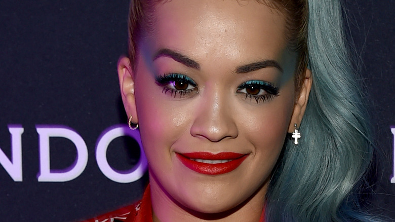 Rita Ora smiling at Santa Monice Pier in 2014